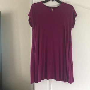 Purple shirt but can be worn as a dress